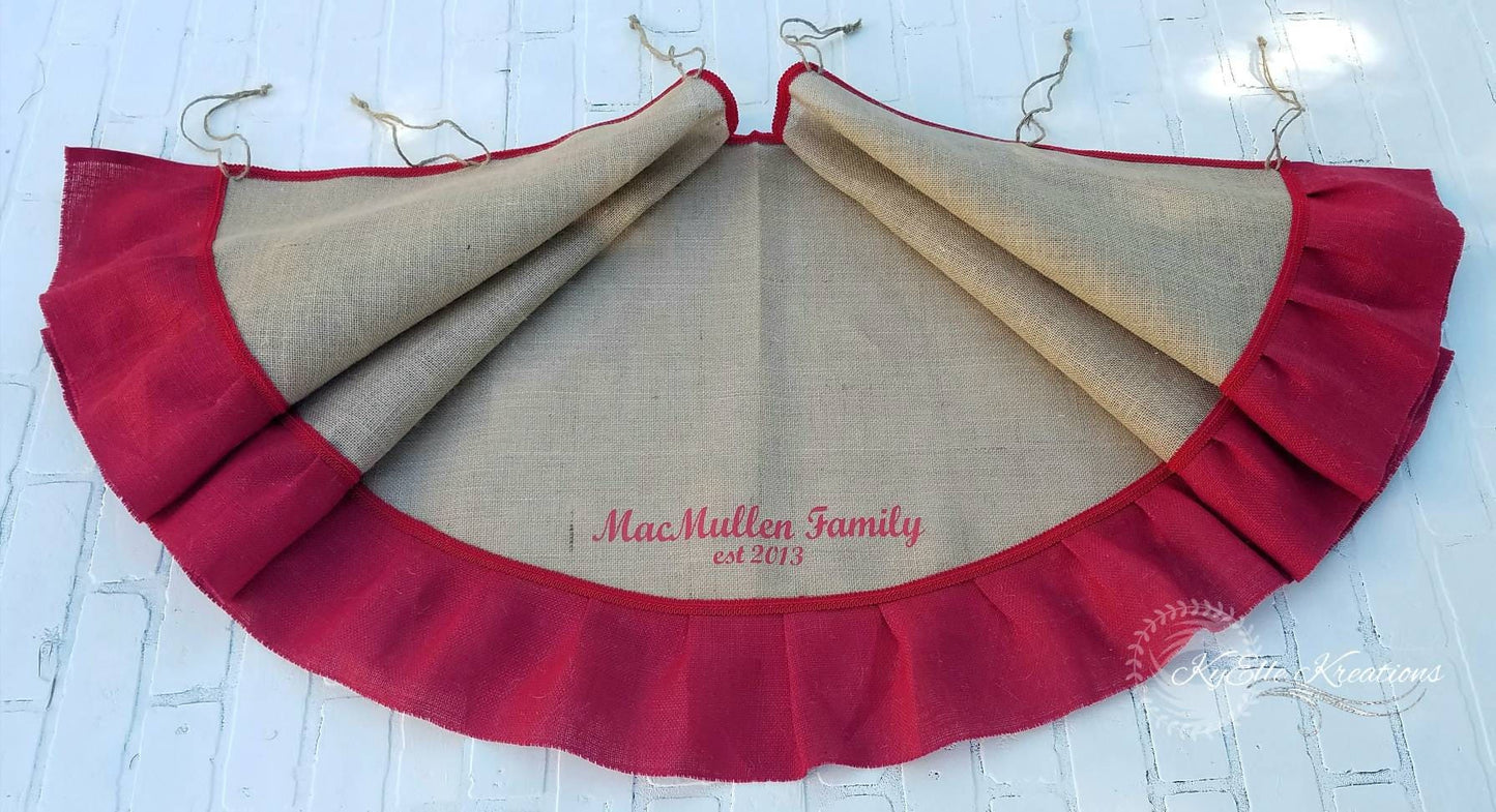Tan Burlap Christmas Tree Skirt with Red outer ruffle. Skirt is personalized with family name, MacMullen Family. Established 2013