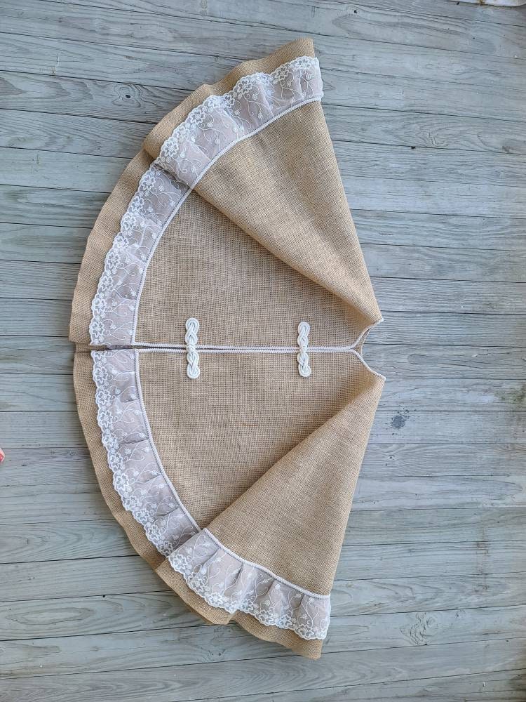 Tan Burlap Christmas Full image of Tree Skirt with additional Ivory Lace ruffle.