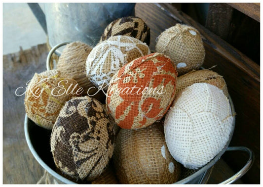 Handmade Burlap Easter Eggs in modern colors, burnt orange, chocolate, tan and creams. Displayed in tin bucket.