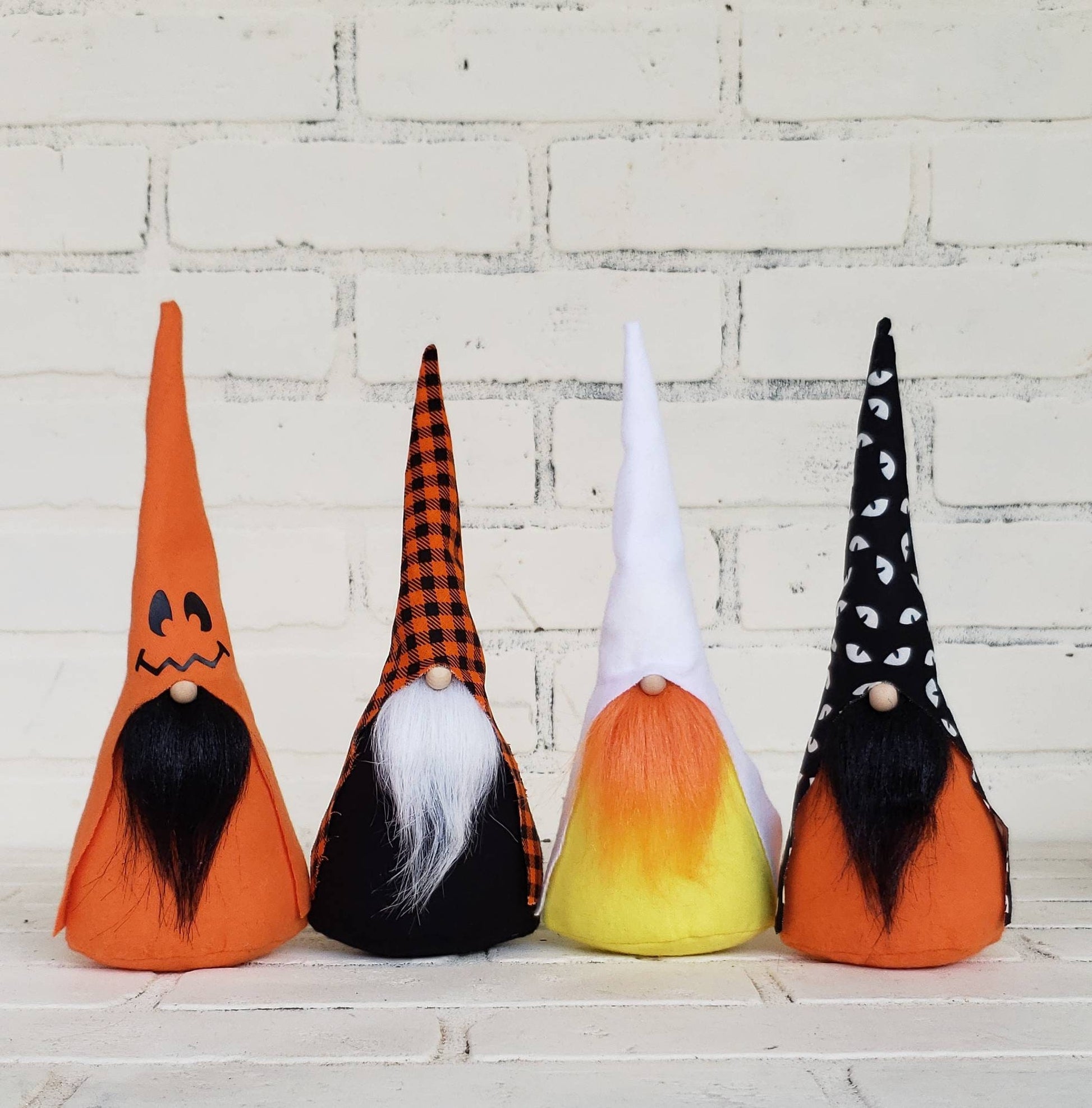 Halloween Gnome collection comprised of Jack-O-Lantern, Buffalo Plaid, Candy Corn and Glow in the dark eyes.