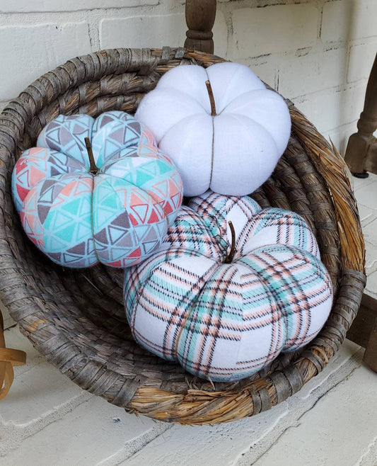 Fall Pumpkin trio set in aqua, peach and white plaid. Displayed in hand woven basket.